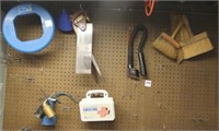 Contents of peg board: asstd tools, oil cans