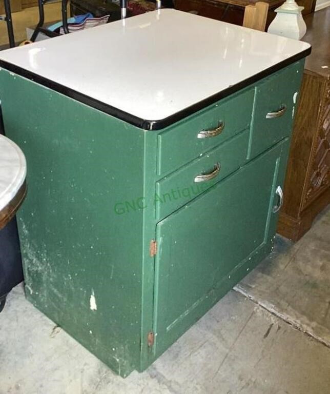 Vintage wooden kitchen cabinet with a married