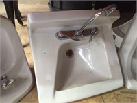 Porcelain sink with hardware