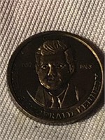 1963 John F Kennedy coin size of a penny
