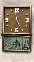 Clock with farm scene.