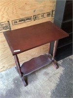 Antique occasional table with bookshelf