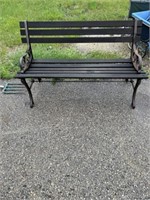 Outdoor metal and wooden sitting bench