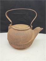 Primitive cast iron kettle
