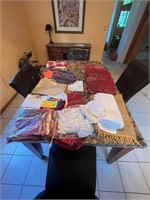 Large lot of nice table cloths, and linens