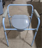 Handicap portable commode by Drive.