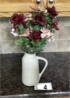 Pottery jug vase with silk flowers
