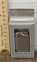 Electric shock lighter. New. Uses 1 AAA battery