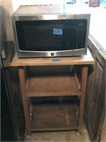 Kenmore Microwave On Wooden Stand