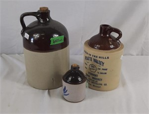 3 crock jugs of  3 different sizes