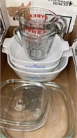 Group of corningware, lids, and pyrex