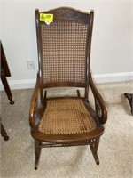 VINTAGE WOODEN ROCKING CHAIR WITH CANE BACK AND SE