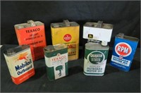 COLLECTION OF (7) ADV. OIL CANS