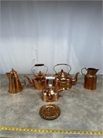 Copper tea pots, kettles, and pitchers
