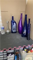 Five Decorative Bottles measuring 10in up to 15in