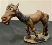 Wooden carved character donkey or horse measuring