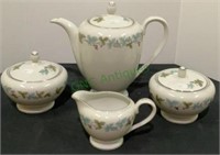 Vintage China includes tea pot, two sugar