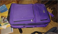 Suitcase with Group of Bags