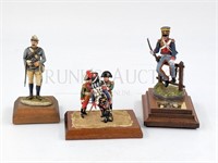 (3) LARGE LEAD SOLDIERS ON WOODEN STANDS