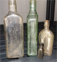 Group of 4 Antique Medicine Bottles