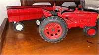 McCormick Farmall die-cast tractor and trailer