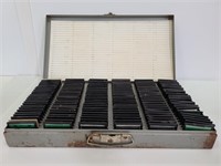 Vintage glass slides in metal case