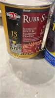 Two partial cans of roof cement