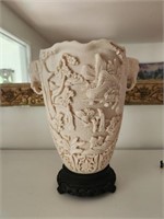 Carved Oriental Vase on Stand.
