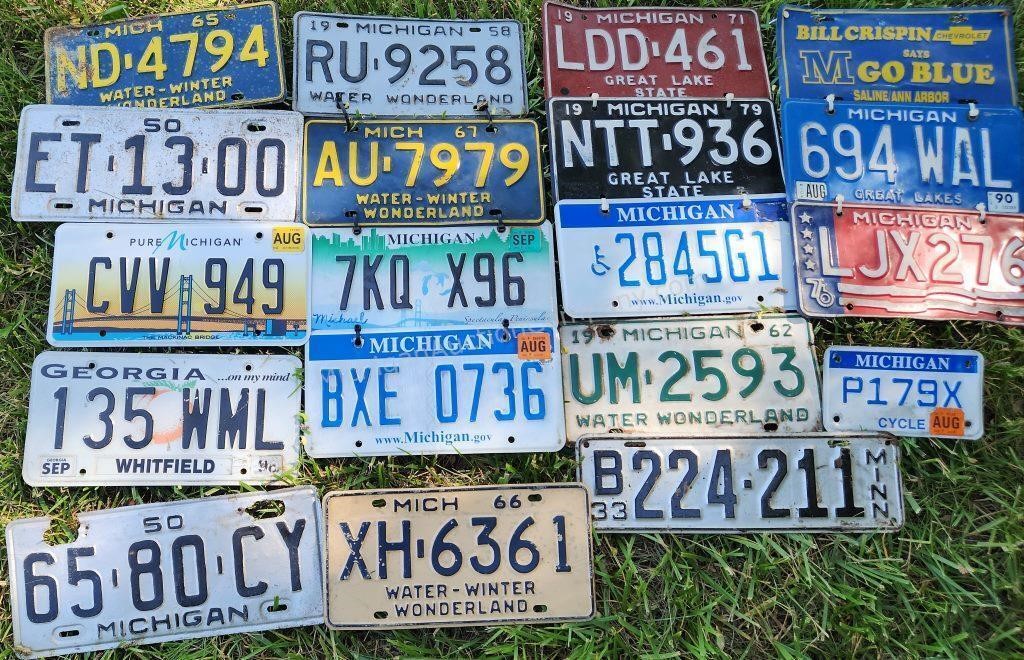 Group of Vintage License Plates w/ 1933 Michigan