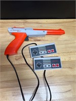 Nintendo Zapper and 2 Controllers