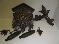 Vintage Germany cuckoo clock with two weights.