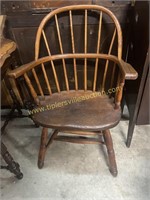 Antique arm chair with hand dished seat contour