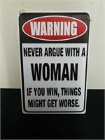 8X 11.75 in warning never argue with a woman
