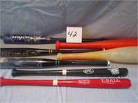 Lot of baseball bats, wooden, plastic and aluminum
