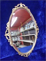 Oval Beveled Mirror in Gilt Metal Frame