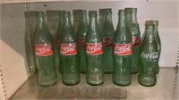 (11) Vintage Green Glass Coca-Cola Bottles