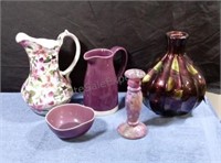 Purple toned pitchers, vases and a bowl