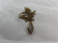 533 gold necklace w/ diamonds, .126oz