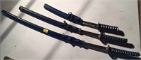 Set of 3 black katanas