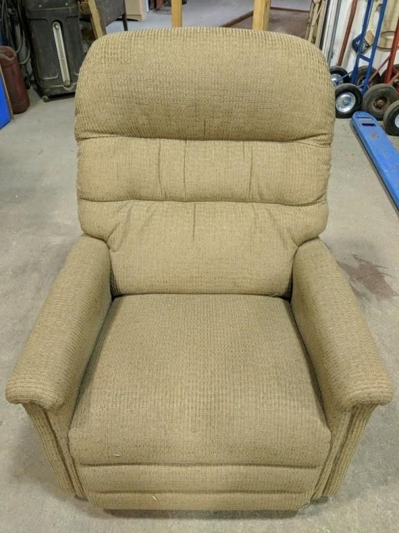 Rocker/  Recliner Chair measures 32" x 27" x 39"