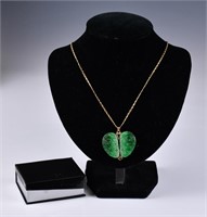 A Jadeite Pendant with A 14K Gold Necklace