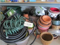 assorted gradening pots, hoses, bird feeders