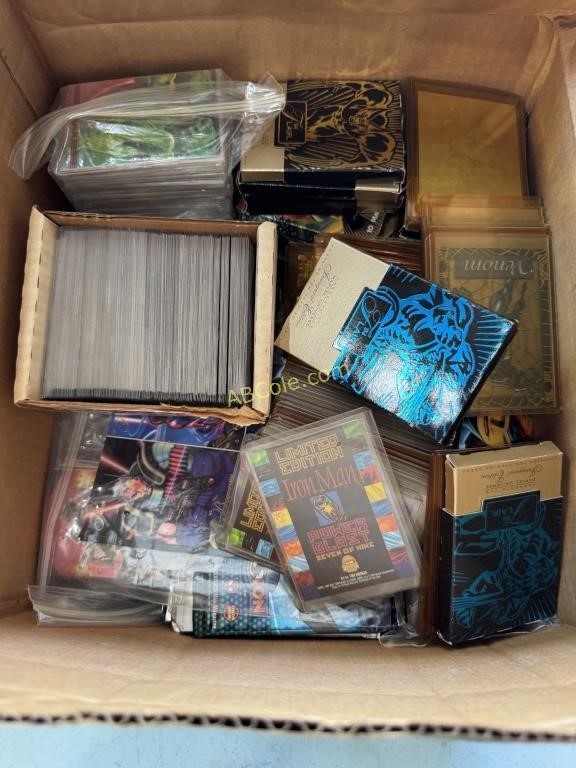 Box of DC and Marvel trading cards in Binder