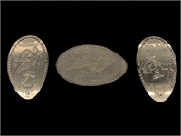 Three Silver-toned Disneyland Pressed Coins -