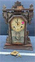 Ornate Gingerbread Type Clock. With key and