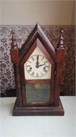 Antique wood mantel clock. 
Waterbury CT. 
Key