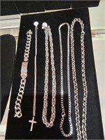 4 men's necklaces  and one bracelet