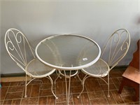 Rod iron glass top  table and 2 chairs