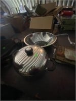 stainless steel bowls and sauce pot