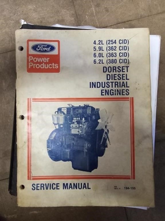 1+/- Box of Assorted Shop and Parts Manuals.